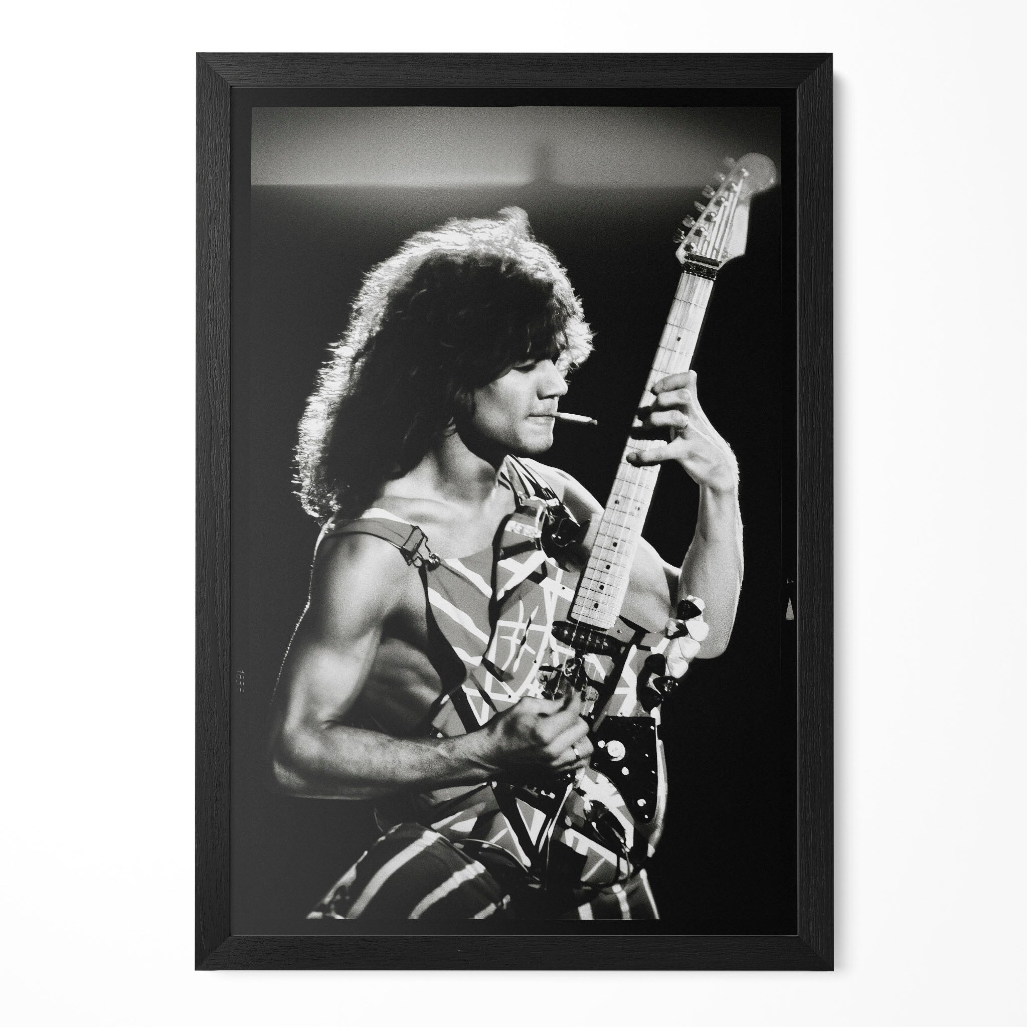 Eddie Van Halen 1982 Diver Down Tour black and white poster in a premium classic black wooden frame by POSTEREVER.