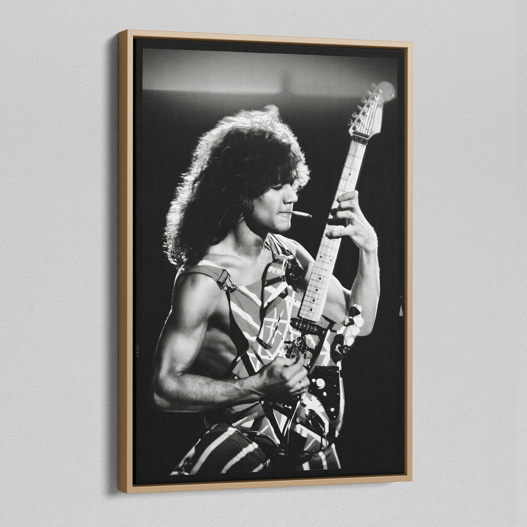 Angled view of the black and white canvas in a modern natural oak wood floating frame.