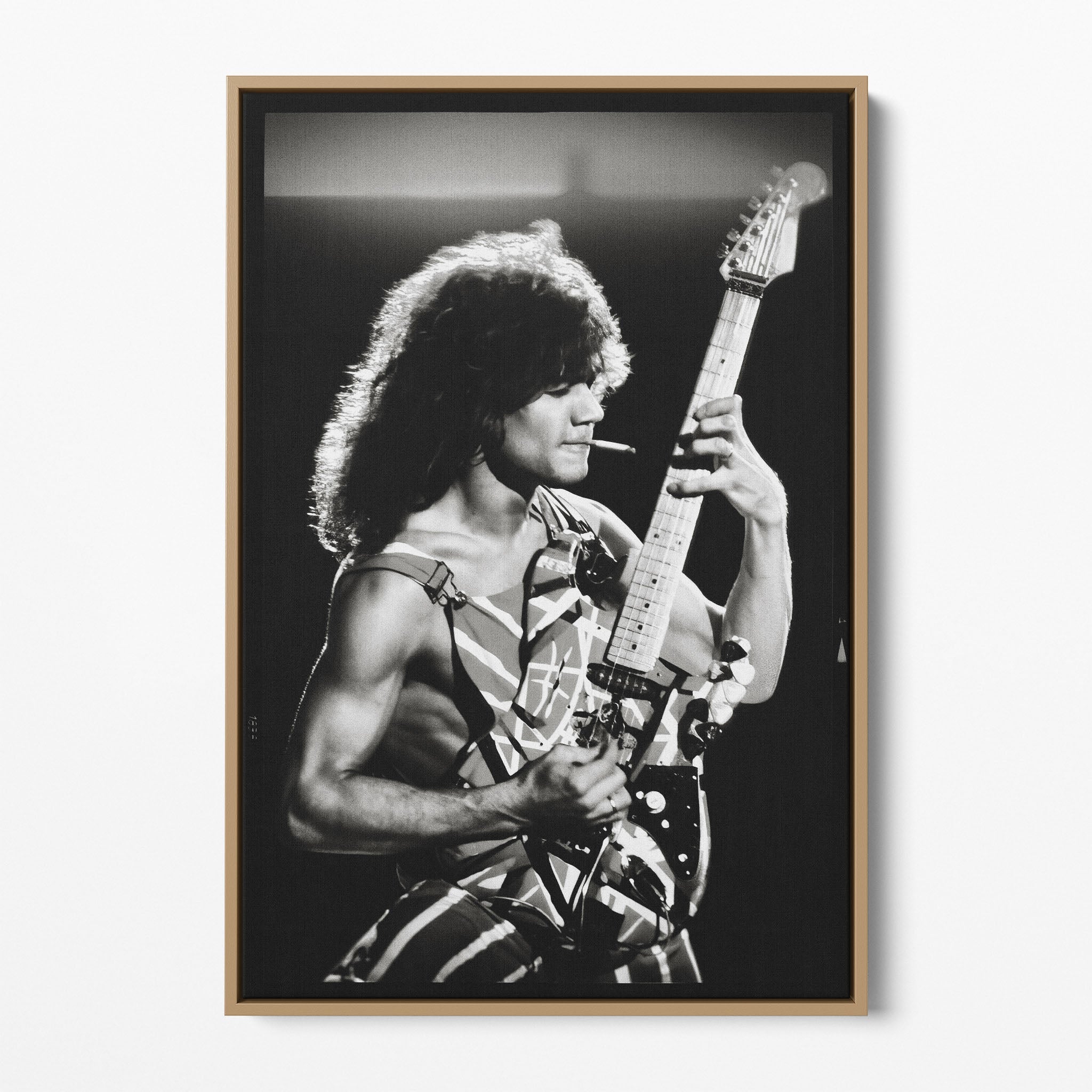 Front display of the Eddie Van Halen black and white canvas in a premium natural wood floating frame.