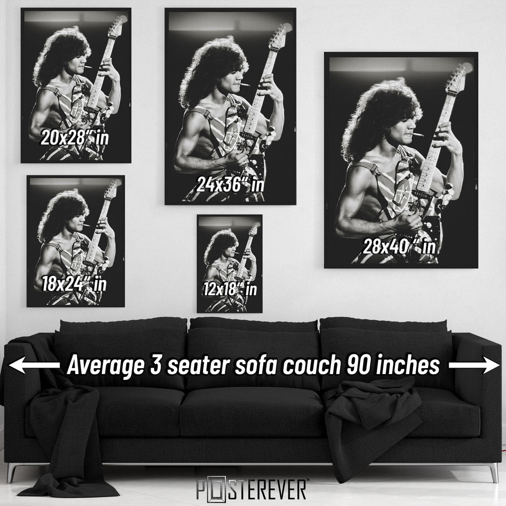 Eddie Van Halen black and white wall art size comparison chart shown above an average 90-inch three-seater sofa.