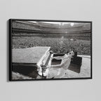 Side angle of the Elton John 1975 black and white canvas in a luxury minimalist black floating frame.