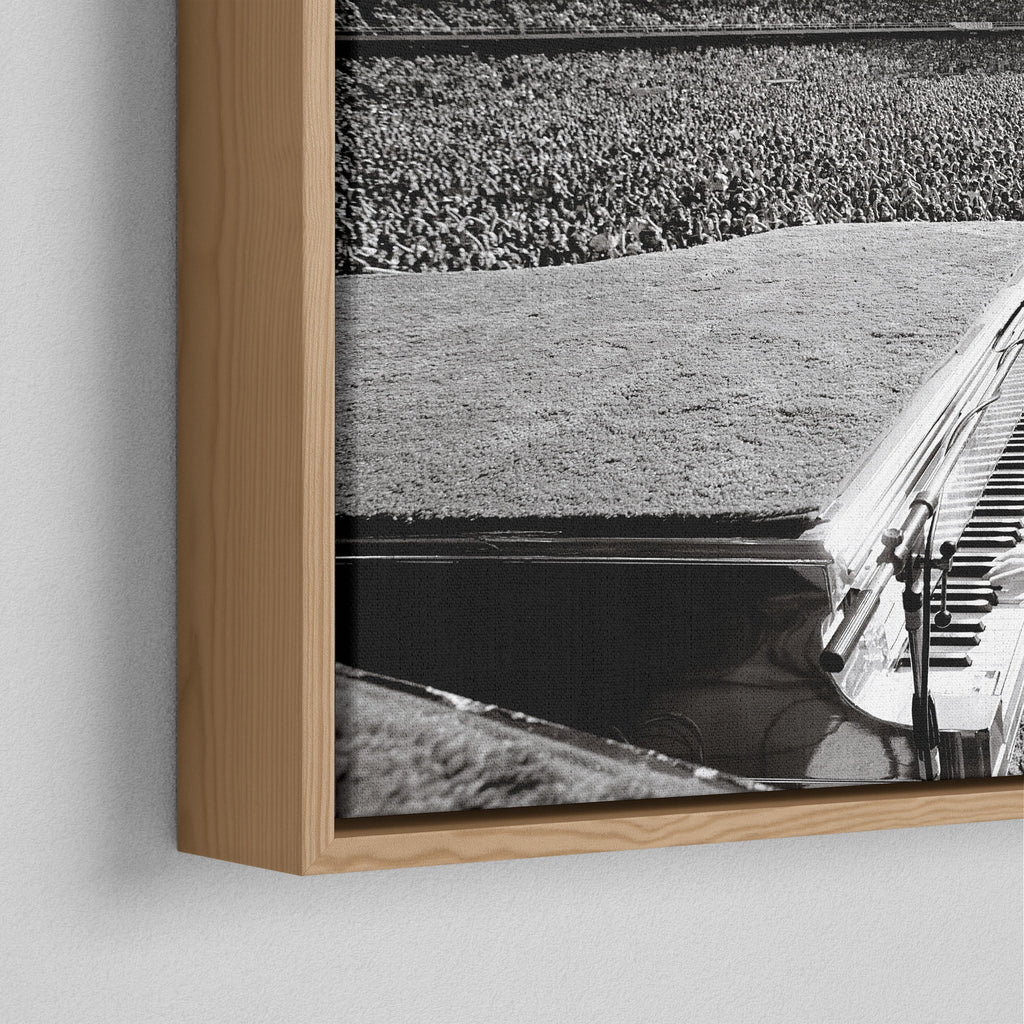 Corner close-up of the floating gap and grain texture of the natural wood canvas frame.