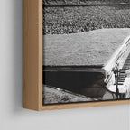 Corner close-up of the floating gap and grain texture of the natural wood canvas frame.