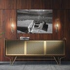 Sleek aluminum black and white metal print of Elton John displayed over a mid-century modern credenza.