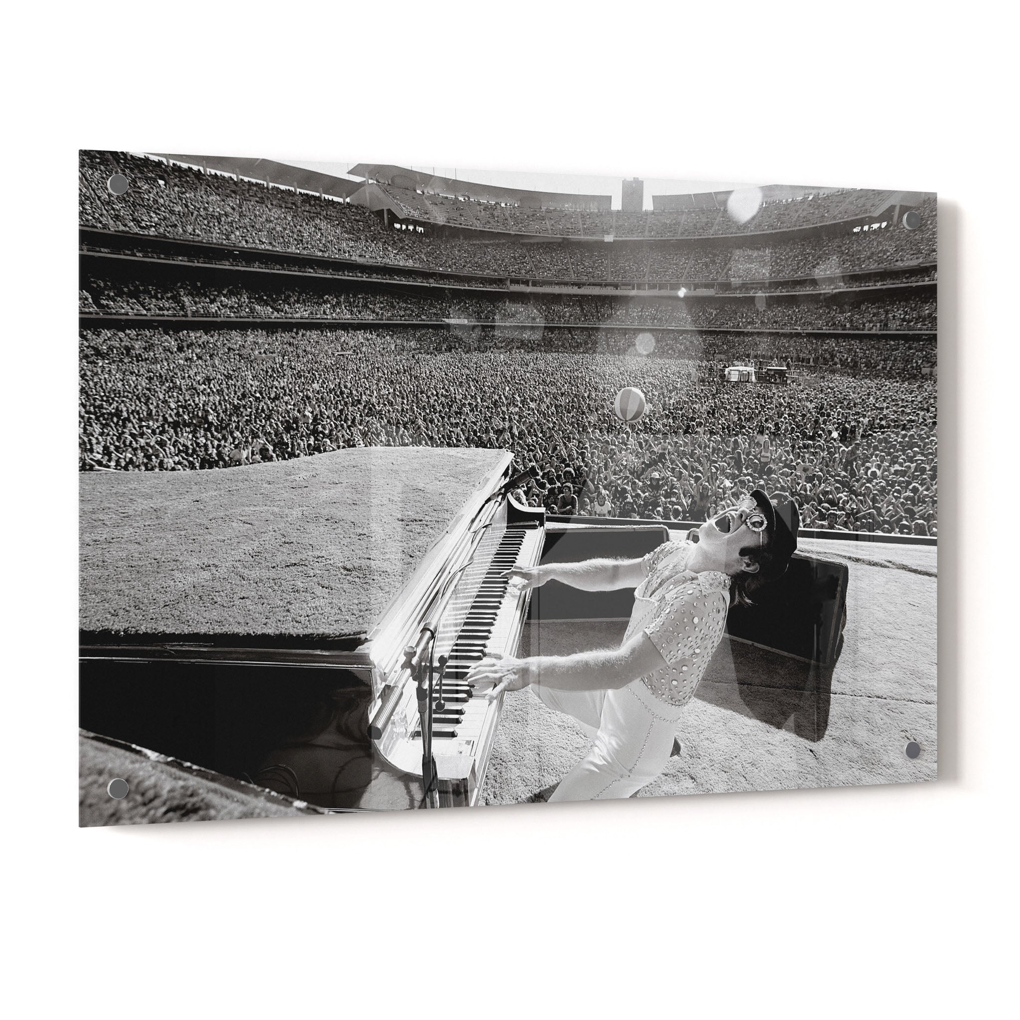 Crystal-clear acrylic glass black and white art print of Elton John 1975 with polished edges.