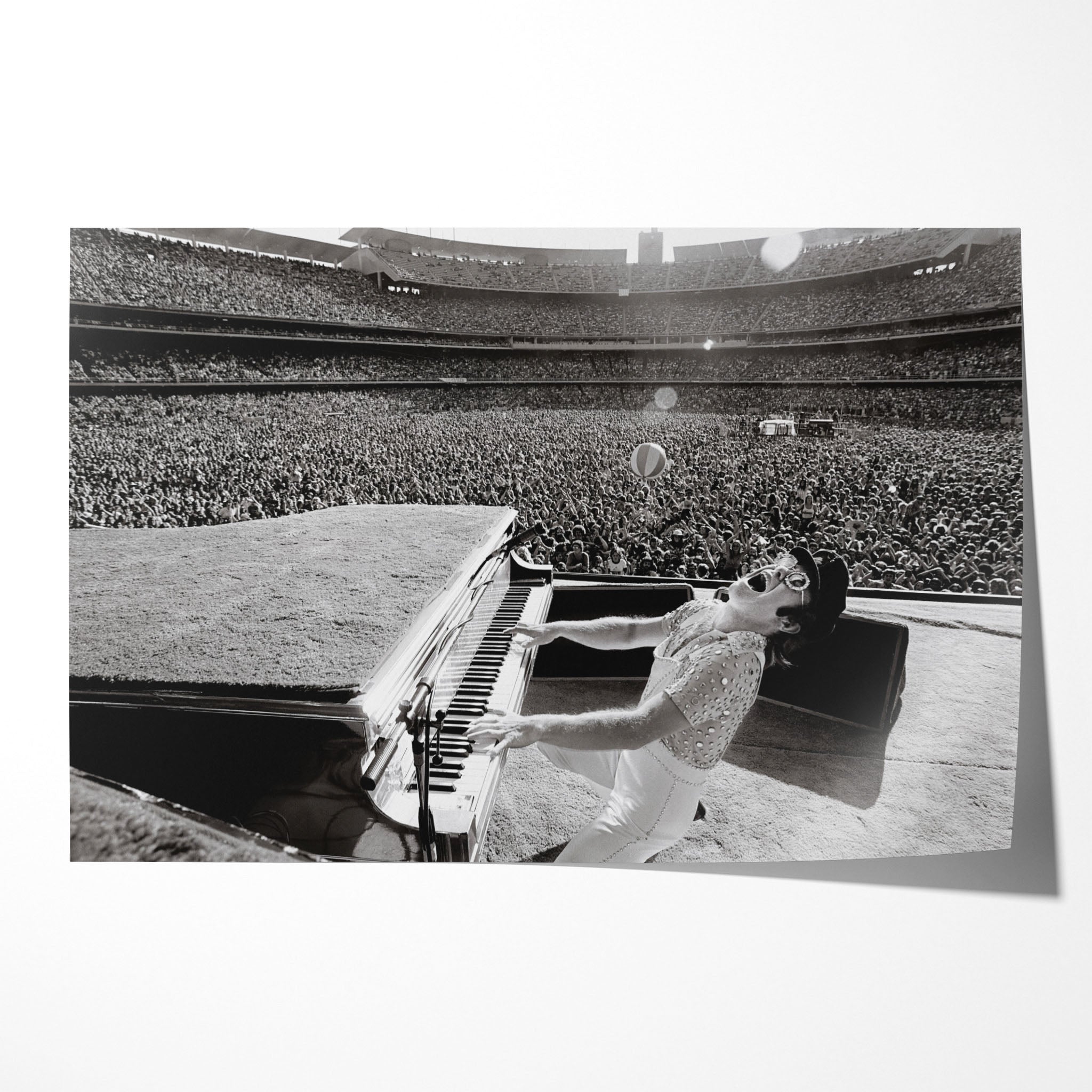 Unframed black and white Elton John 1975 Dodger Stadium First Set concert poster print in his studded jumpsuit at the piano before 100,000 fans.
