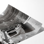 Angled close-up of the unframed premium matte black and white Elton John 1975 Dodger Stadium poster print.