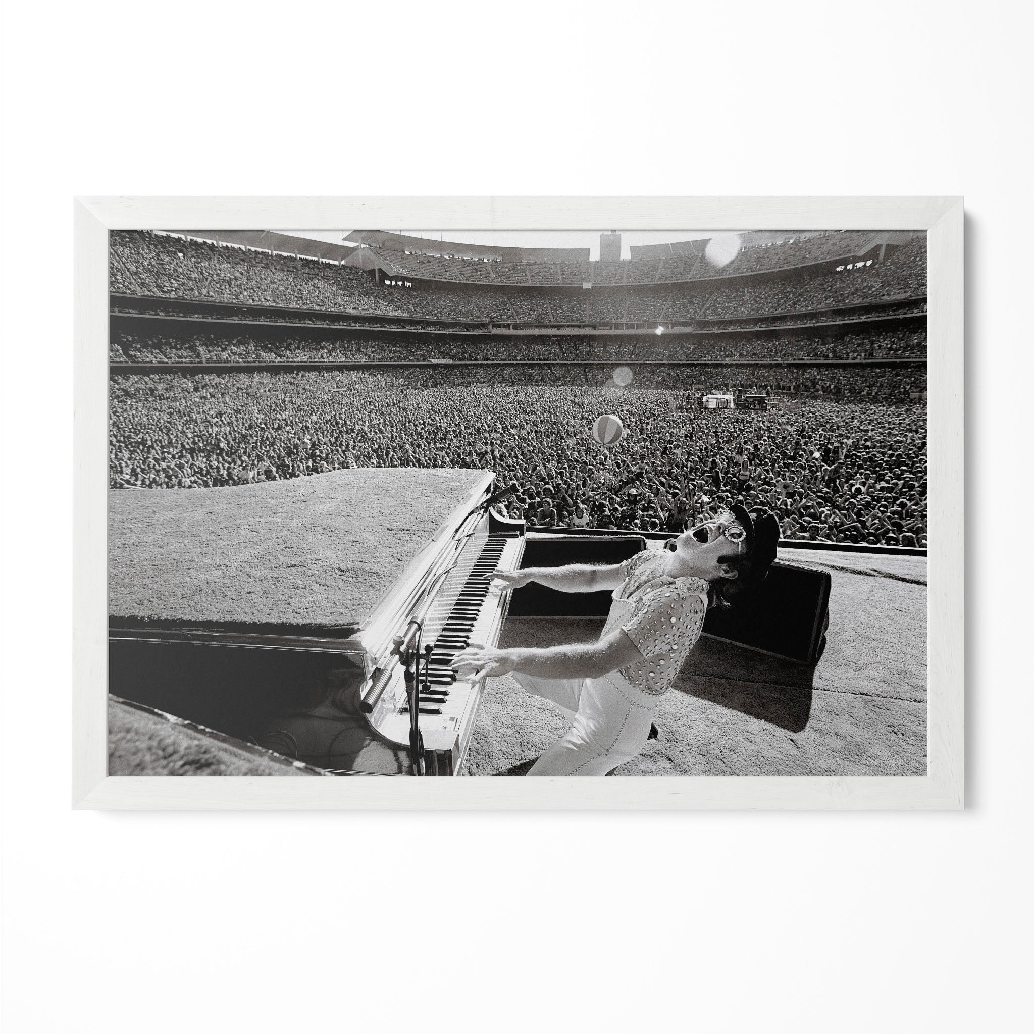 Elton John 1975 Dodger Stadium black and white poster in a modern minimalist white wooden frame by POSTEREVER.