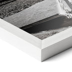 Corner close-up revealing the clean wood grain of the white framed Elton John 1975 black and white art print.