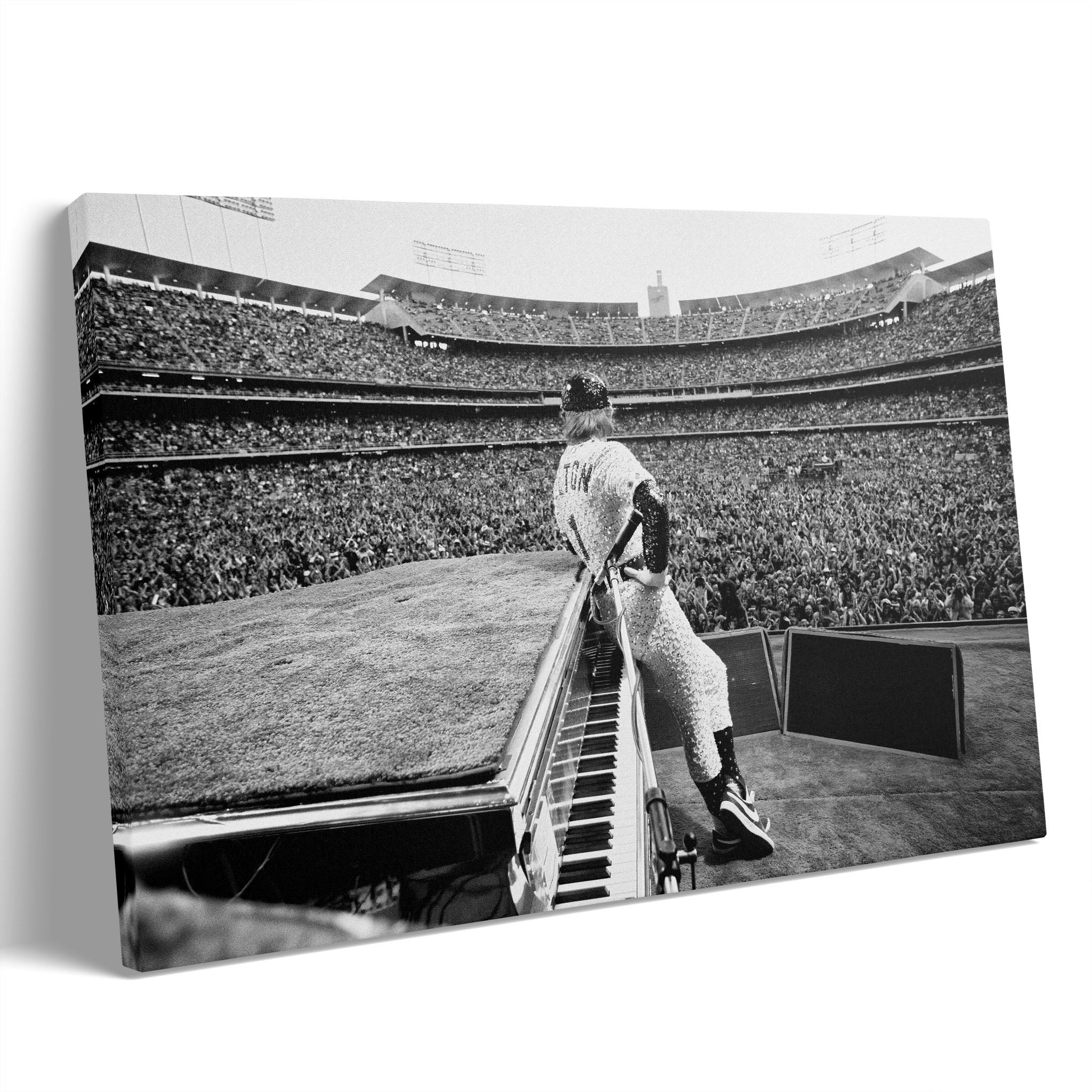 Premium gallery-wrapped black and white canvas print of Elton John live at Dodger Stadium in 1975.
