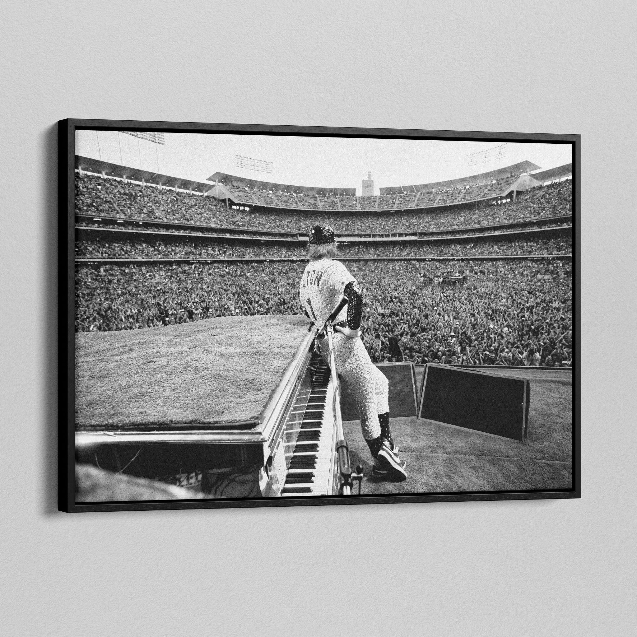 Side angle of the Elton John 1975 black and white canvas in a luxury minimalist black floating frame.
