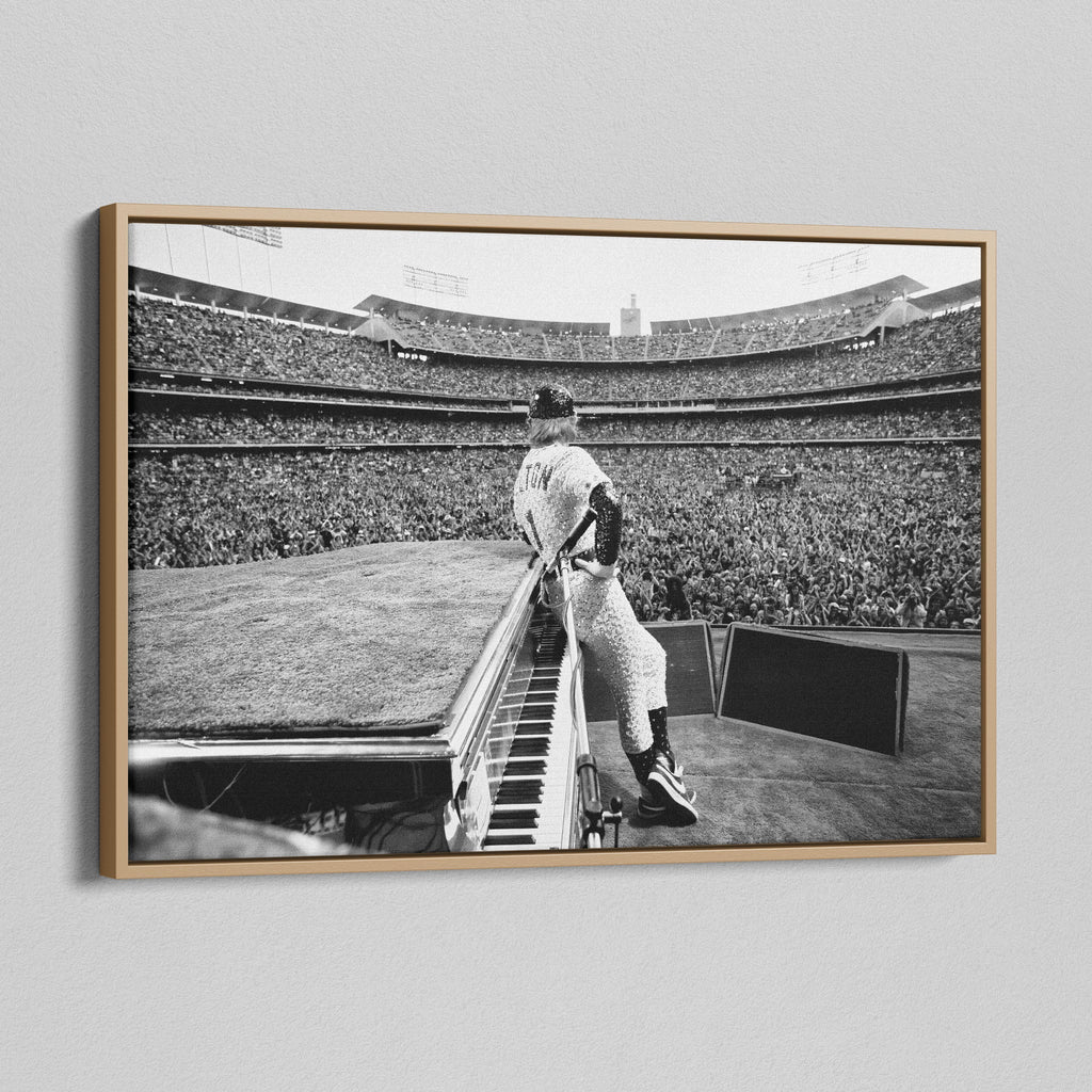 Angled view of the black and white canvas in a modern natural oak wood floating frame.