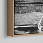 Corner close-up of the floating gap and grain texture of the natural wood canvas frame.