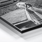 Macro close-up of the ultra-thin aluminum DIBOND panel edge of the Elton John 1975 black and white metal print.
