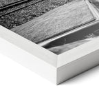 Corner close-up revealing the clean wood grain of the white framed Elton John 1975 black and white art print.