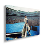 Front view of the heavy-weight colorized canvas wall art print of Elton John in 1975.
