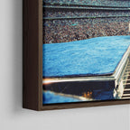 Corner close-up showing the rich grain and joinery of the dark walnut floating canvas frame.