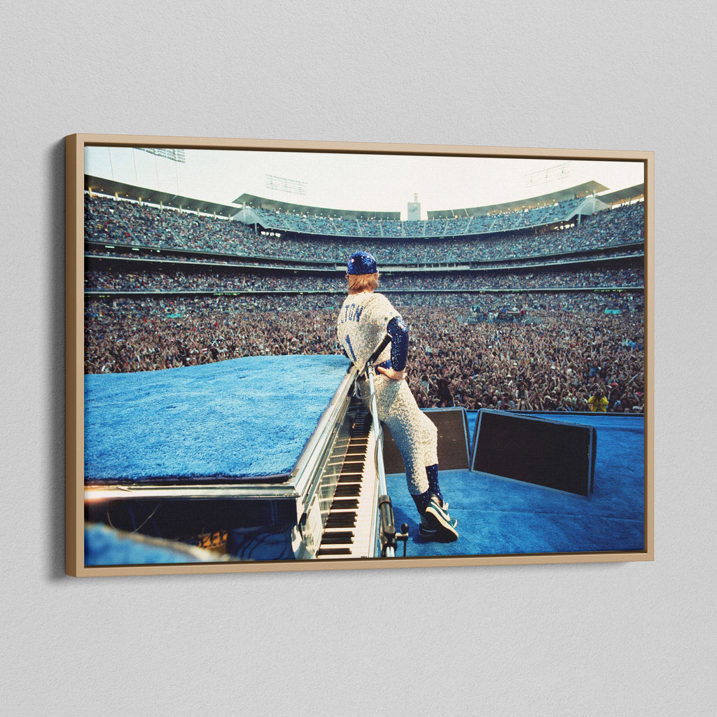 Angled view of the colorized canvas in a modern natural oak wood floating frame.