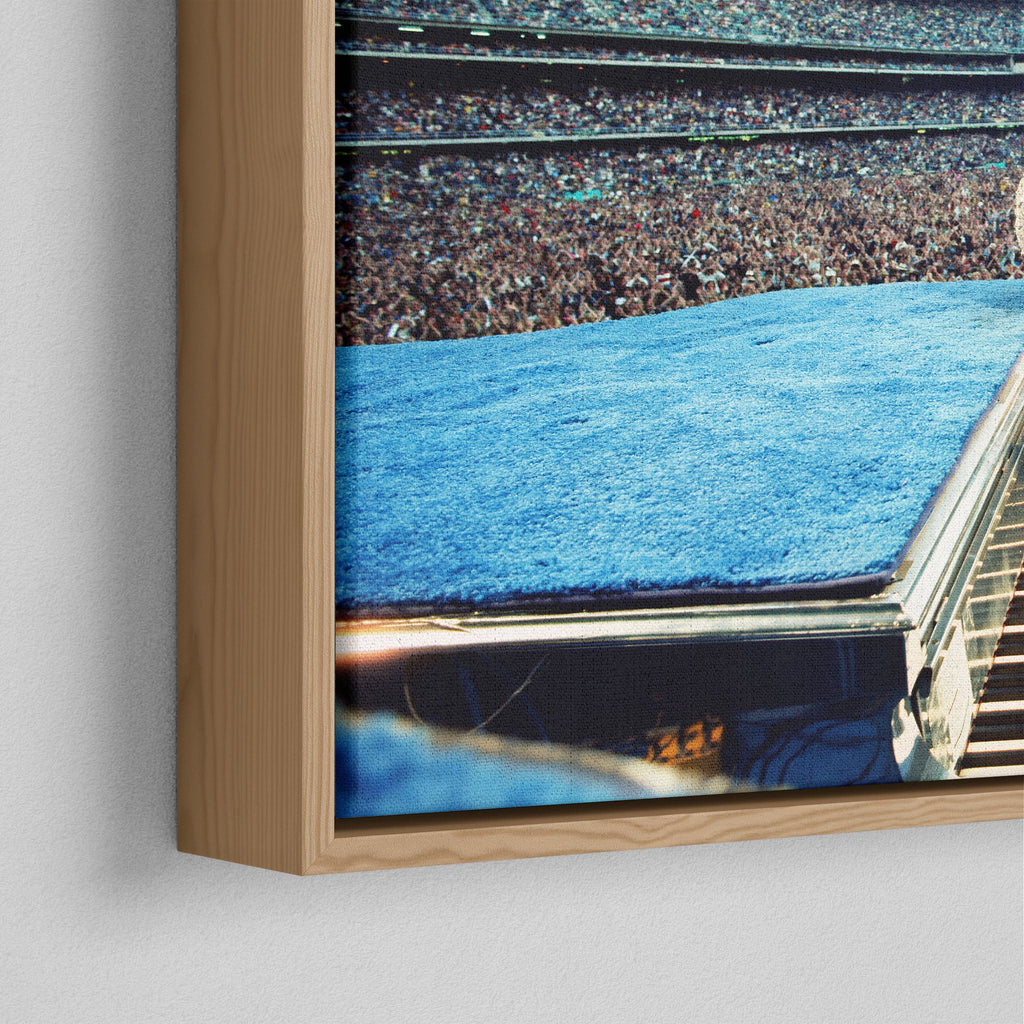 Corner close-up of the floating gap and grain texture of the natural wood canvas frame.
