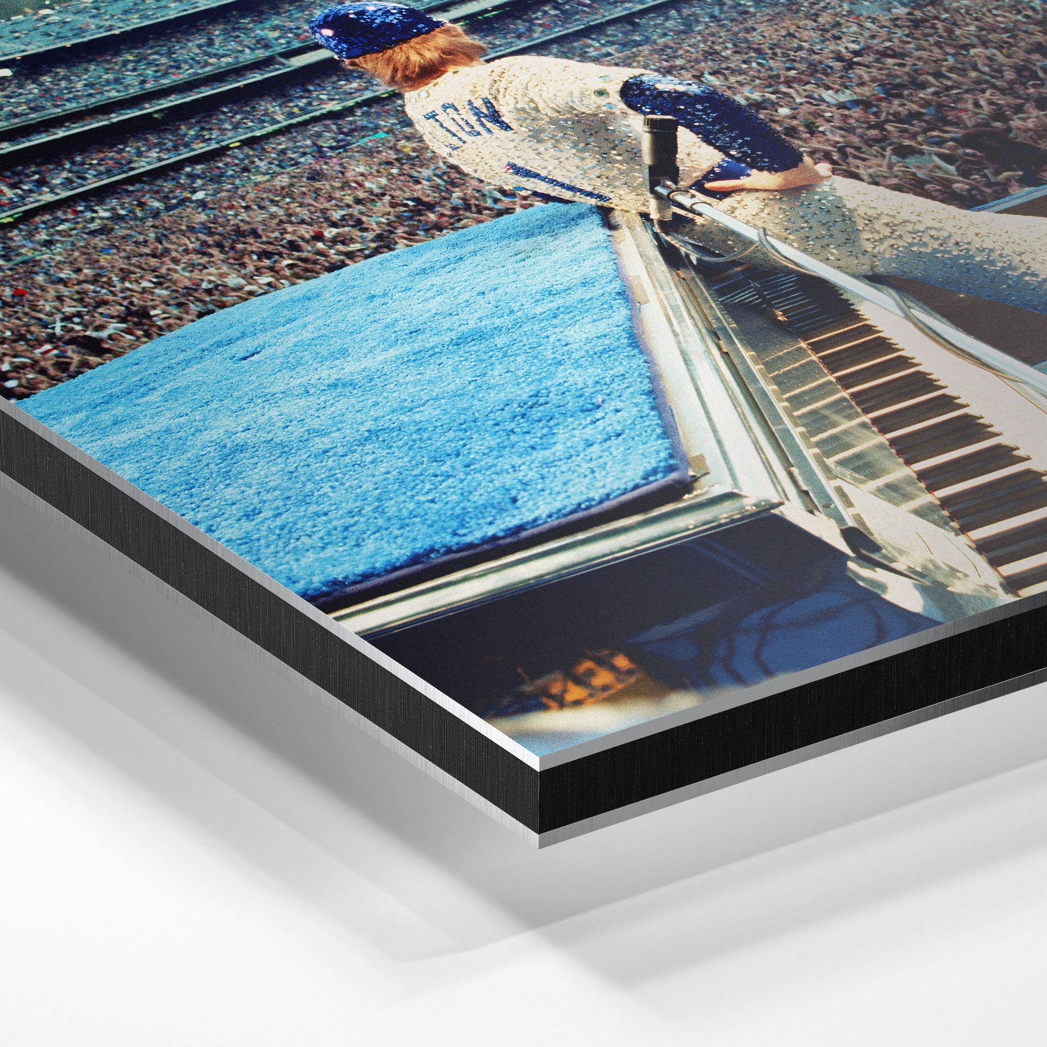 Macro close-up of the ultra-thin aluminum DIBOND panel edge of the Elton John 1975 colorized metal print.