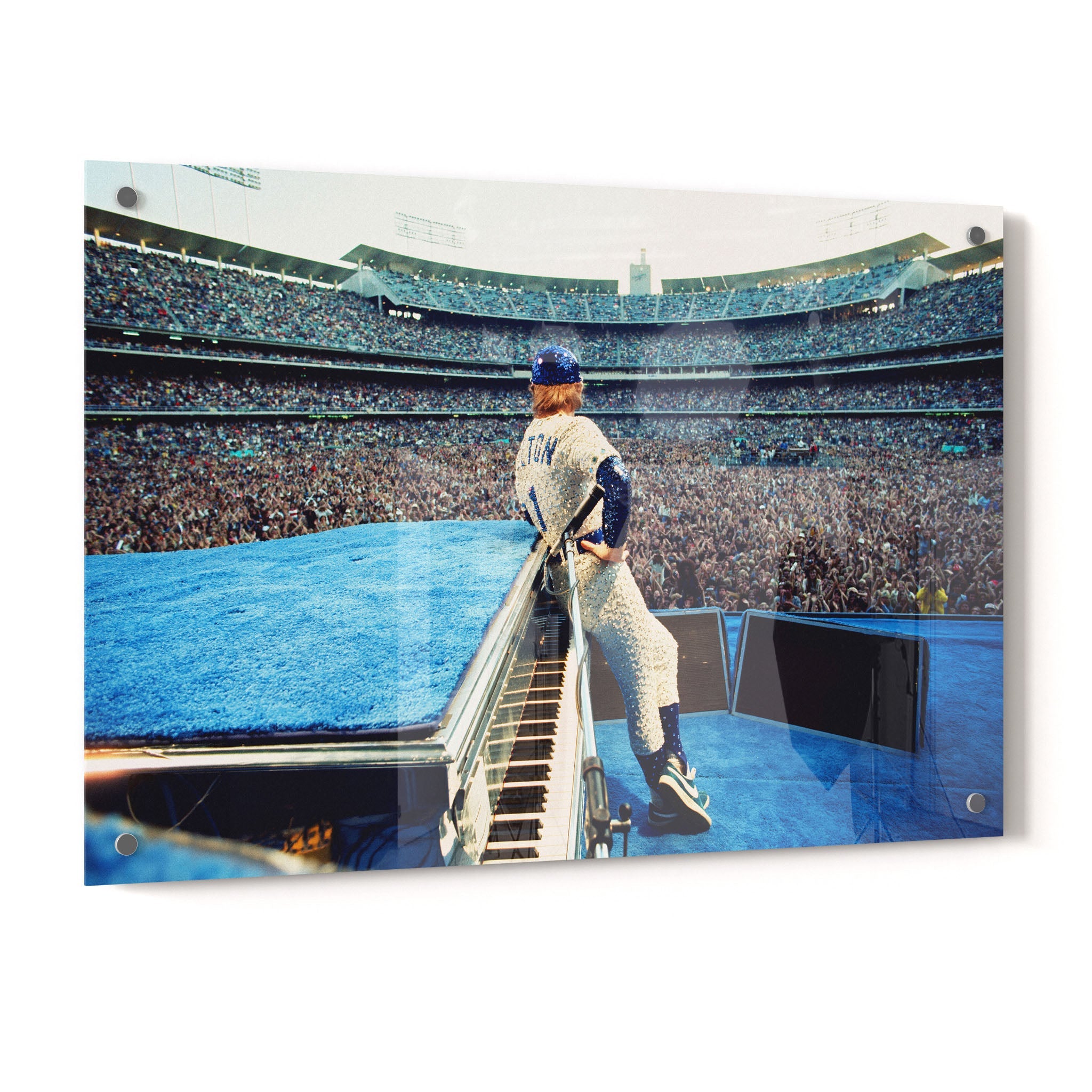 Crystal-clear acrylic glass colorized art print of Elton John 1975 with polished edges.