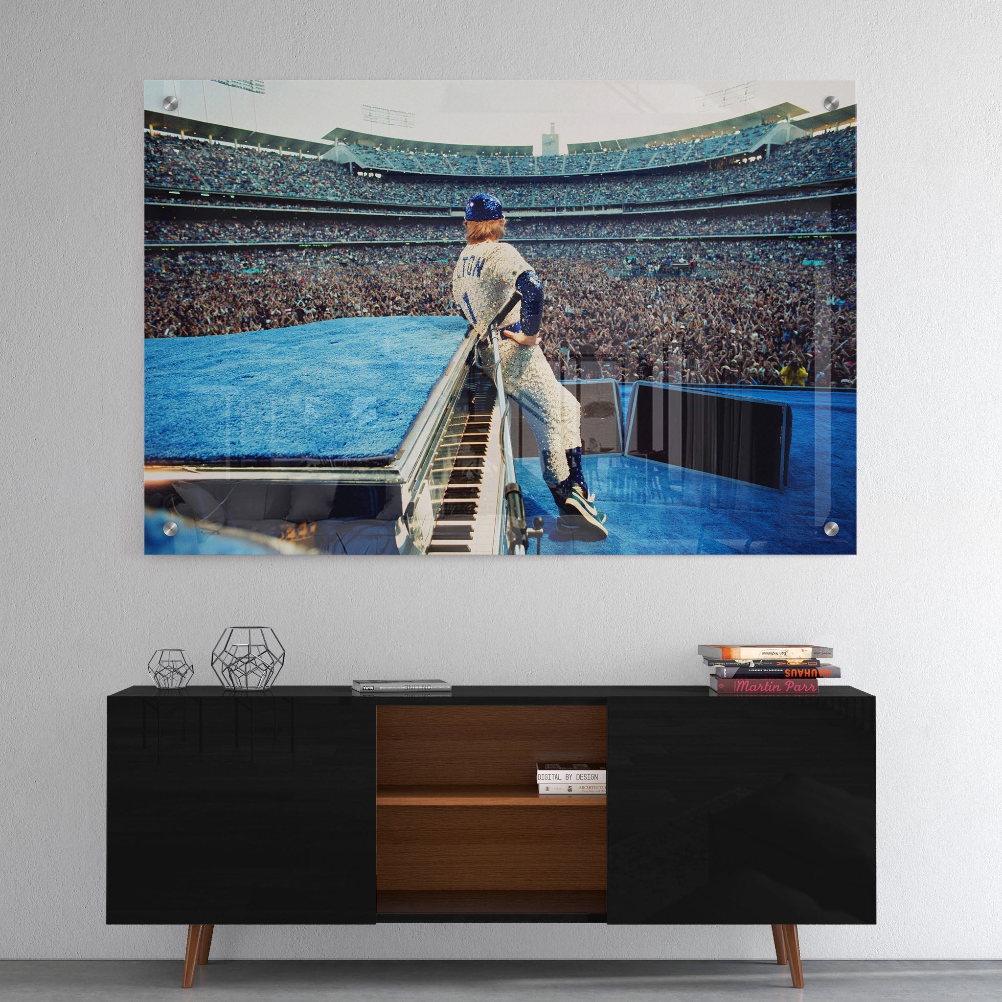 High-gloss acrylic glass colorized print of Elton John displayed above a contemporary console.