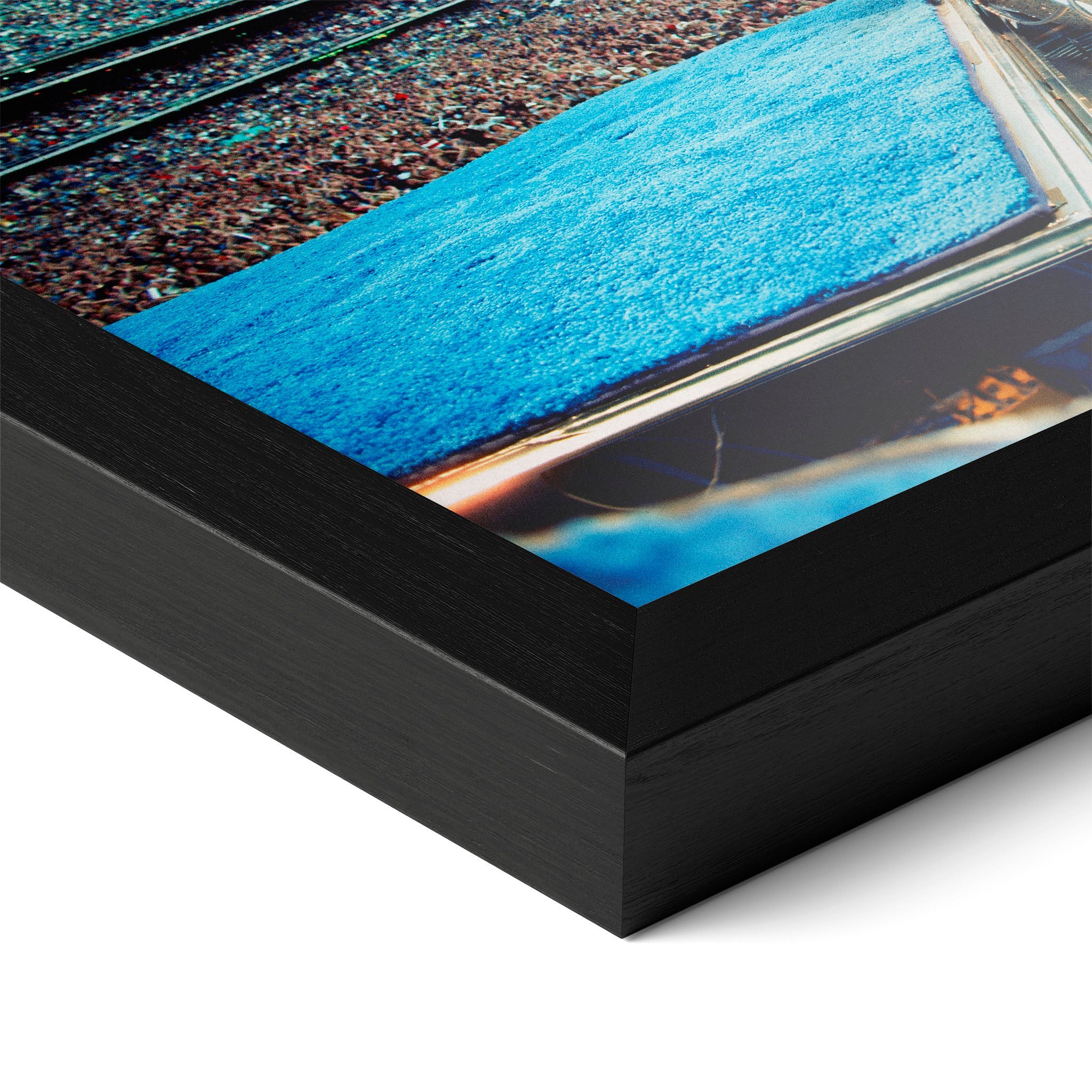 Detailed corner close-up of the premium black wooden frame holding the Elton John 1975 colorized concert poster.