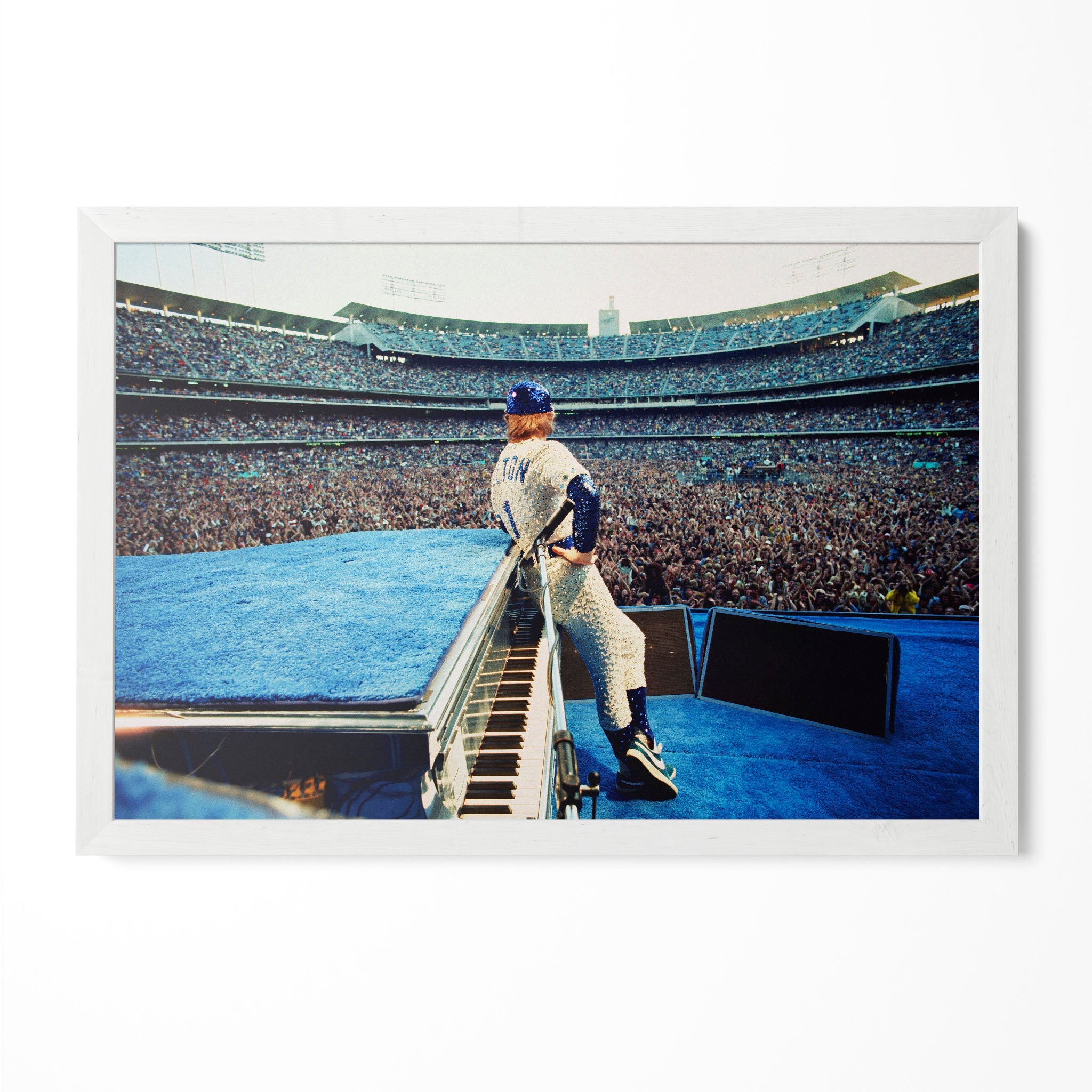 Elton John 1975 Dodger Stadium colorized poster in a modern minimalist white wooden frame by POSTEREVER.