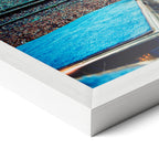 Corner close-up revealing the clean wood grain of the white framed Elton John 1975 colorized art print.