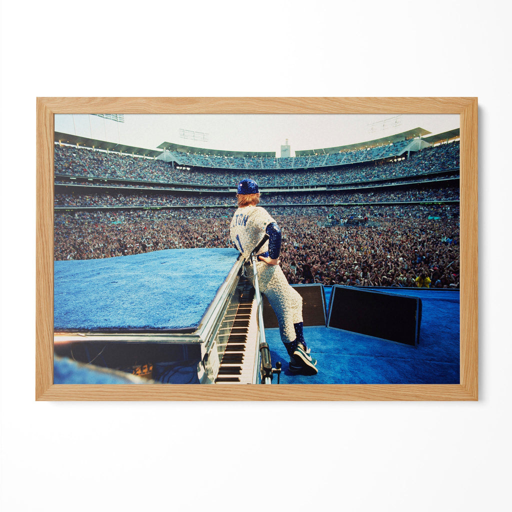 Elton John 1975 Dodger Stadium colorized poster in a premium natural oak wood frame by POSTEREVER.