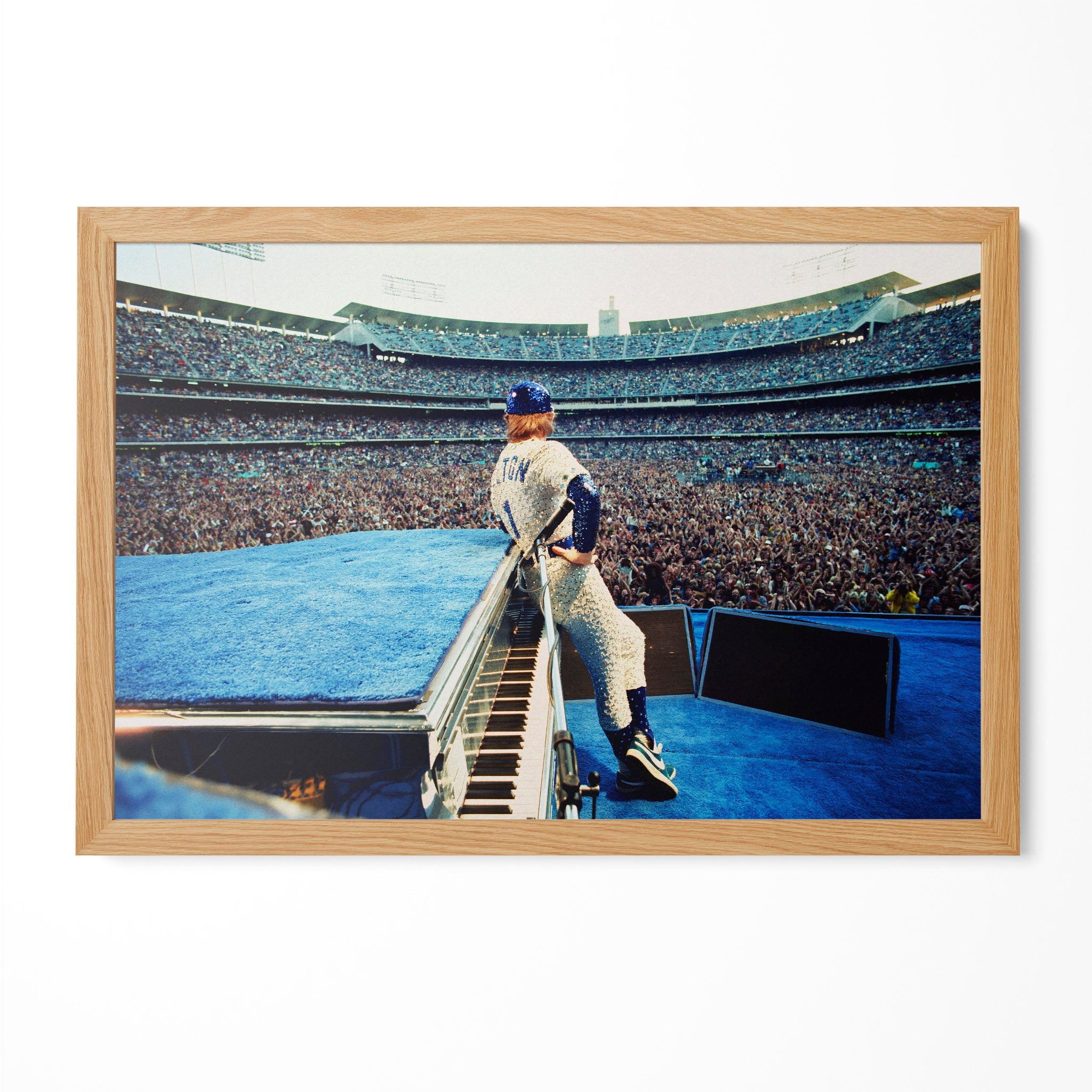 Elton John 1975 Dodger Stadium colorized poster in a premium natural oak wood frame by POSTEREVER.