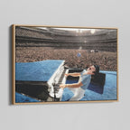 Angled view of the colorized canvas in a modern natural oak wood floating frame.