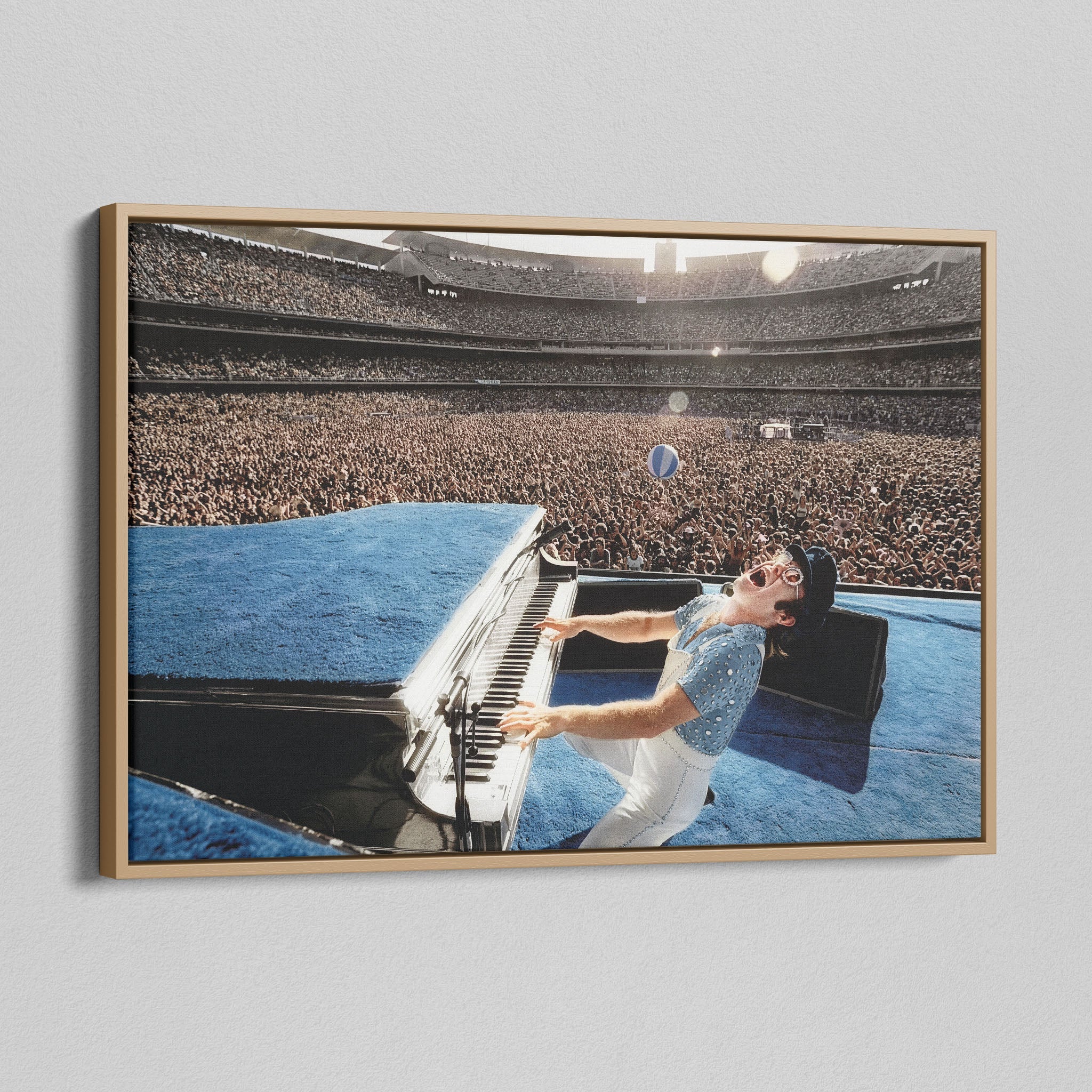 Angled view of the colorized canvas in a modern natural oak wood floating frame.