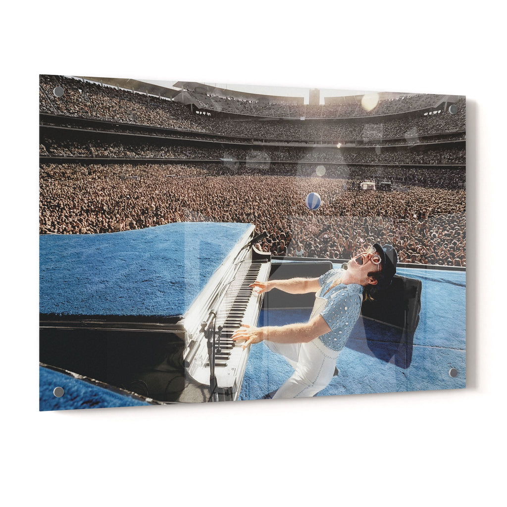 Crystal-clear acrylic glass colorized art print of Elton John 1975 with polished edges.