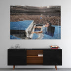 High-gloss acrylic glass colorized print of Elton John displayed above a contemporary console.