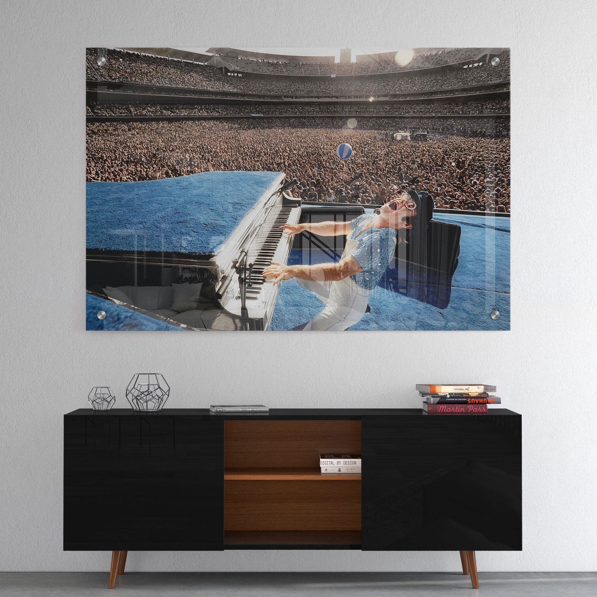 High-gloss acrylic glass colorized print of Elton John displayed above a contemporary console.