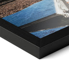 Detailed corner close-up of the premium black wooden frame holding the Elton John 1975 colorized concert poster.