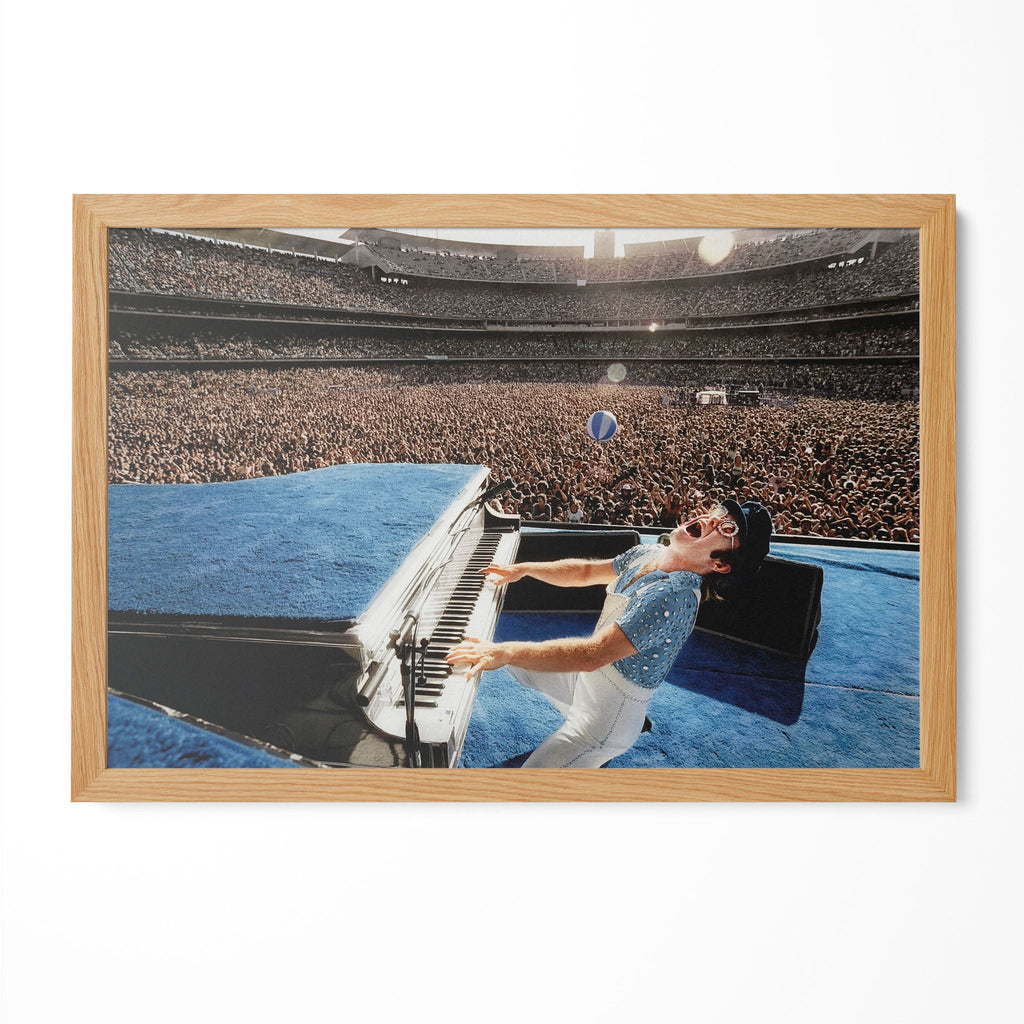 Elton John 1975 Dodger Stadium colorized poster in a premium natural oak wood frame by POSTEREVER.