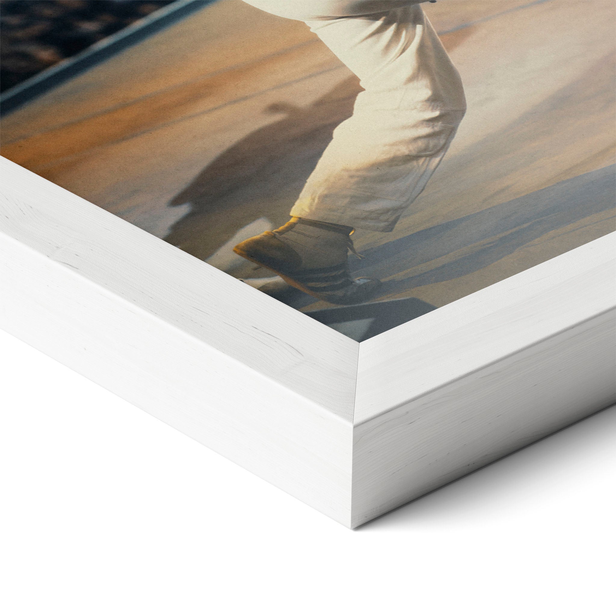 Corner close-up of the Freddie Mercury colour poster in a white frame