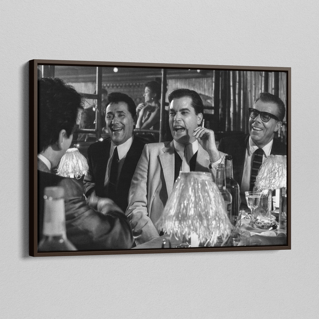 Angled view of the Goodfellas Bamboo Lounge black and white canvas in a sophisticated dark walnut floating frame.