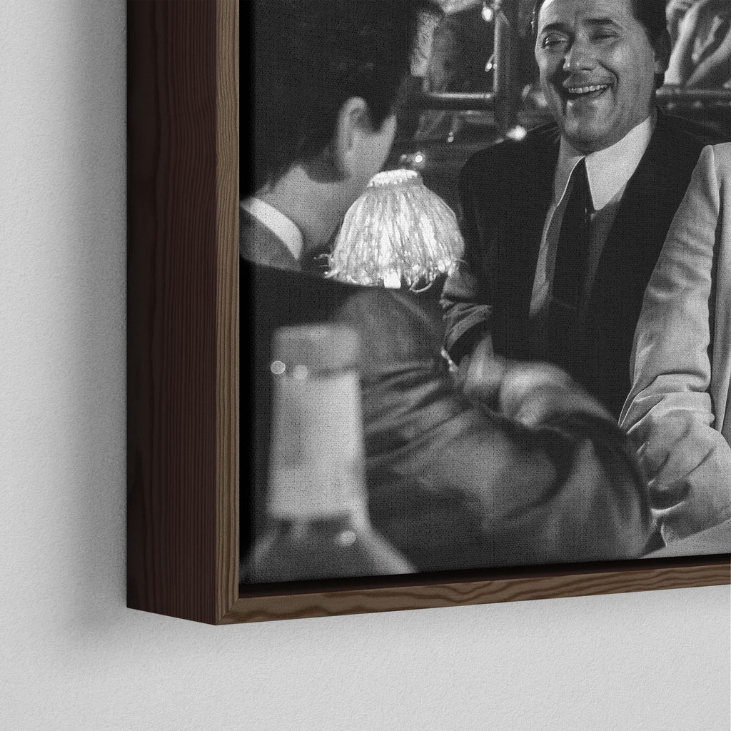 Corner close-up showing the rich grain and joinery of the dark walnut floating canvas frame.