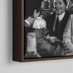 Corner close-up showing the rich grain and joinery of the dark walnut floating canvas frame.
