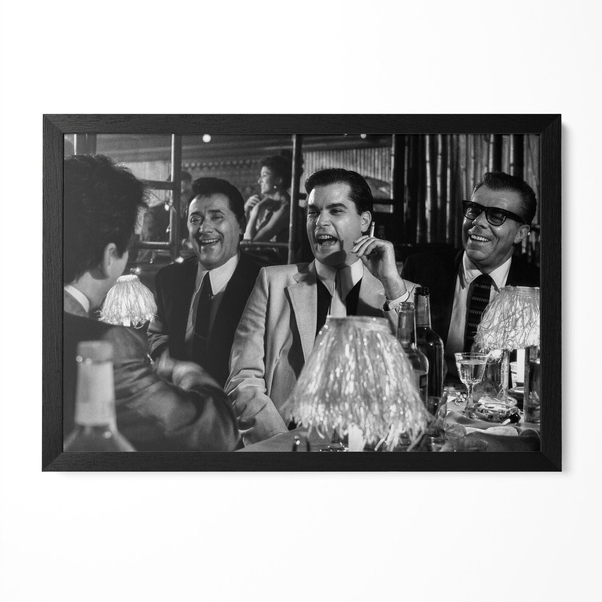 Goodfellas Funny How Bamboo Lounge scene black and white movie poster in a premium classic black wooden frame by POSTEREVER.