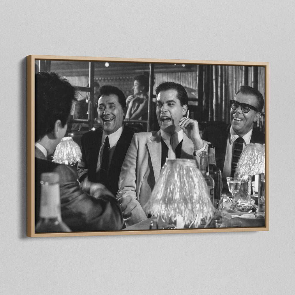 Angled view of the black and white canvas in a modern natural oak wood floating frame.