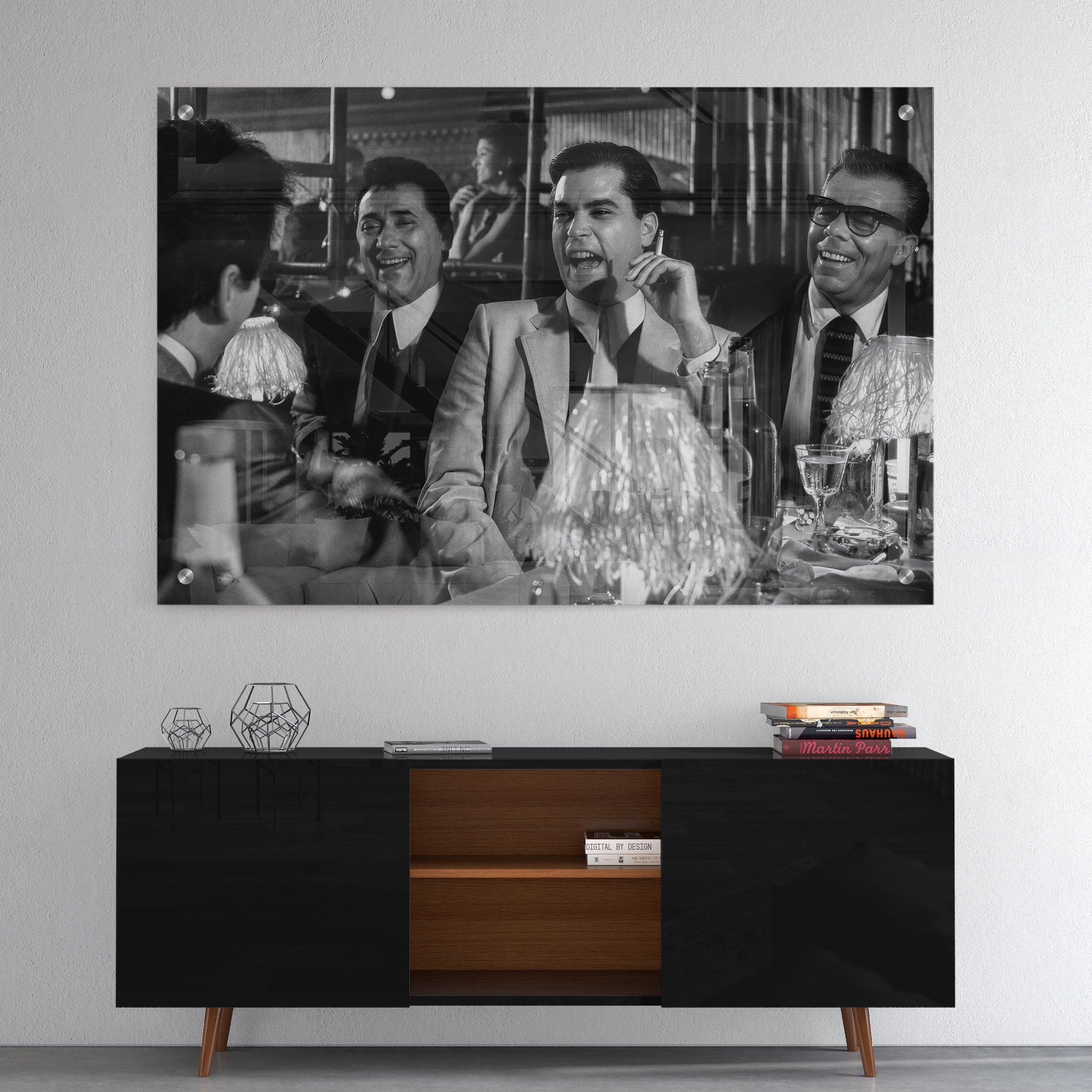 High-gloss acrylic glass black and white print of Goodfellas displayed above a contemporary console.