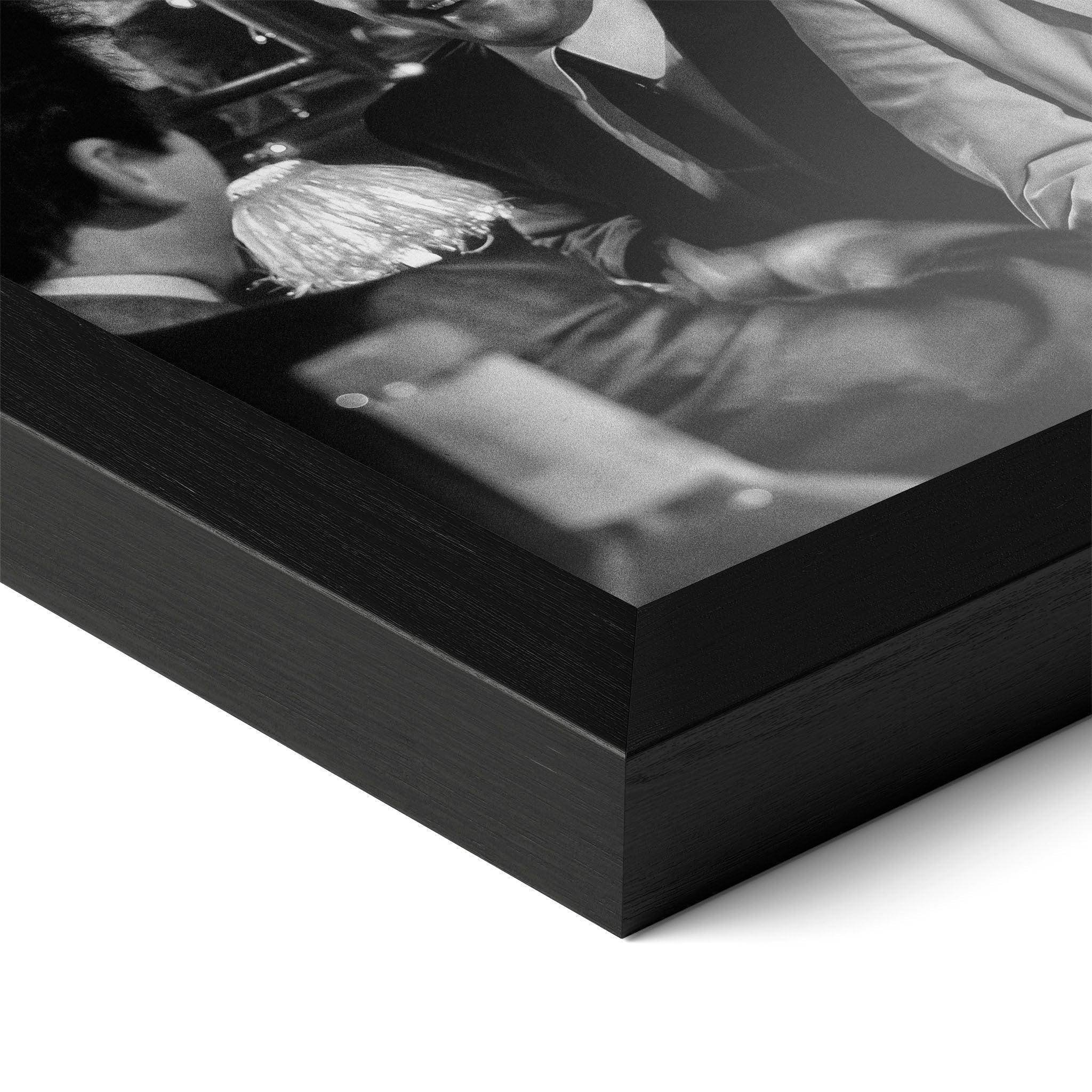 Detailed corner close-up of the premium black wooden frame holding the Goodfellas Funny How black and white poster.