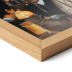 Corner close-up highlighting the natural oak finish of the framed Goodfellas Funny How movie poster.
