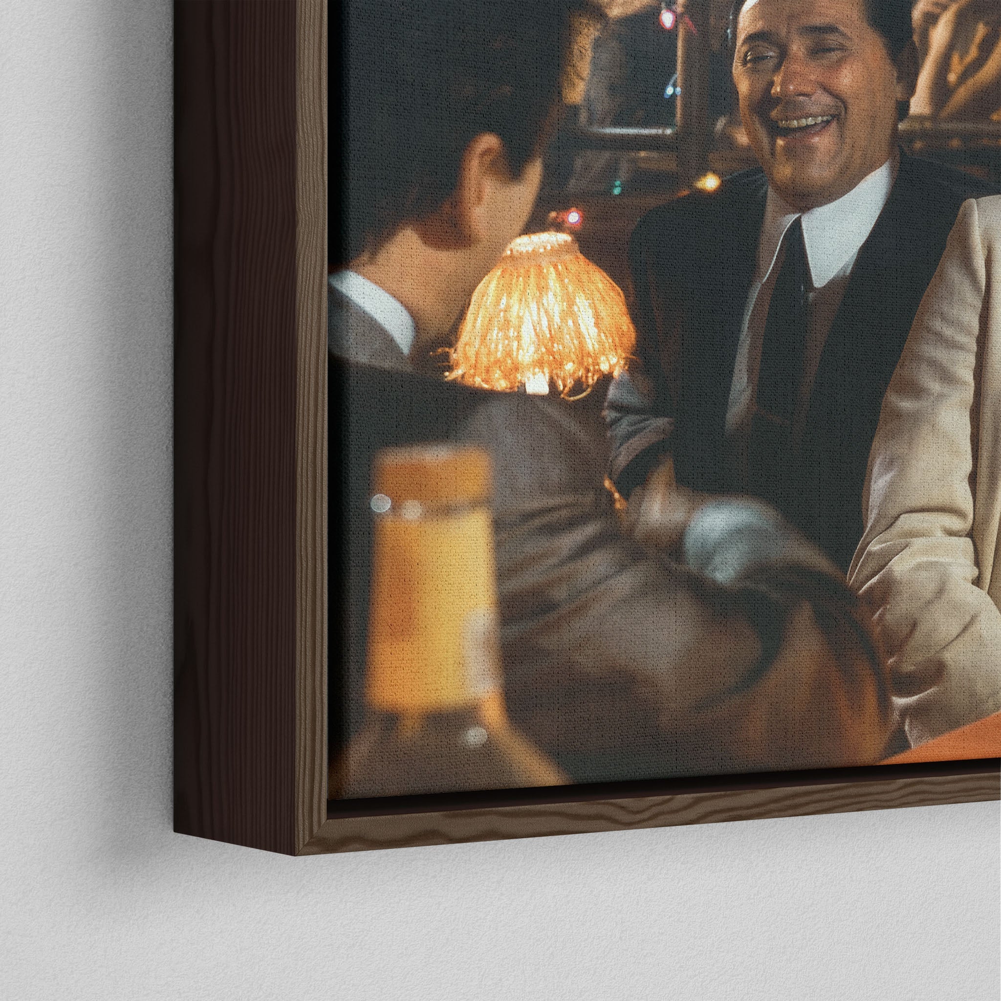 Corner close-up showing the rich grain and joinery of the dark walnut floating canvas frame.