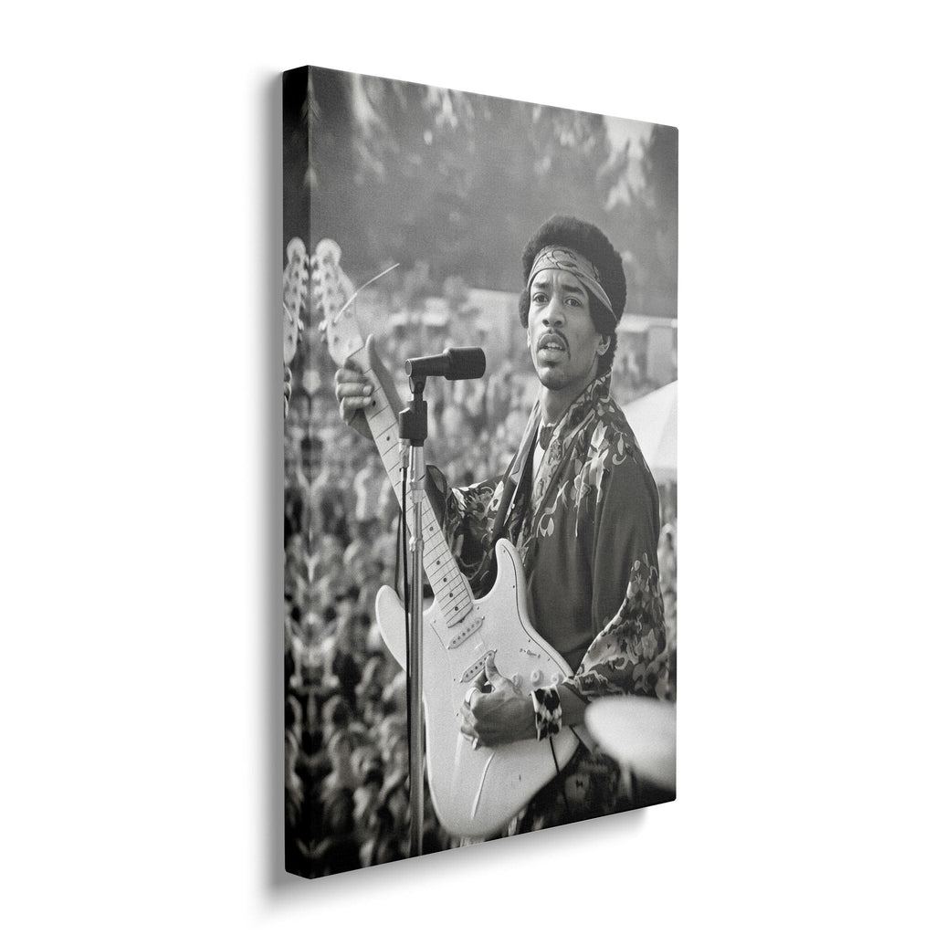 Gallery-wrapped black and white canvas of Jimi Hendrix at Newport displayed on a wall