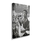 Gallery-wrapped black and white canvas of Jimi Hendrix at Newport displayed on a wall